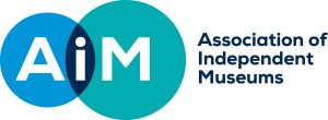 Logo for Association of Independent Museums. Text of the association name is on the right hand side. The initials 'A, I, M' appear on the left over two overlapping blue circles of sightly different shades.